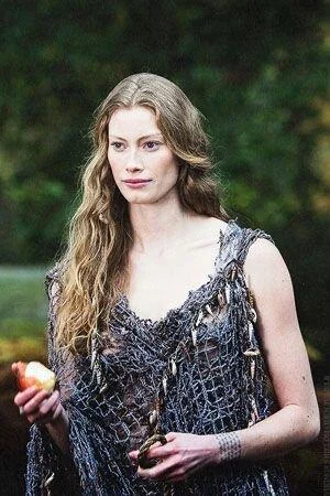 Aslaug holding an apple